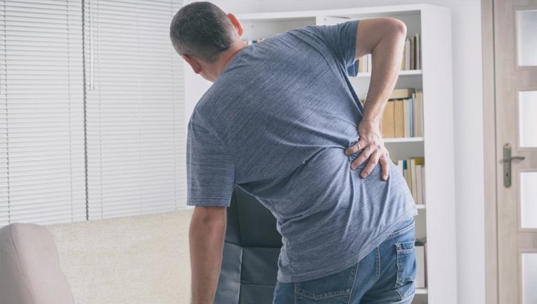 man with sore back pain